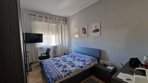 Ingrandisci la foto
