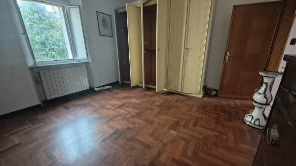 Ingrandisci la foto