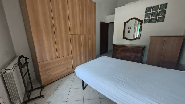 Ingrandisci la foto