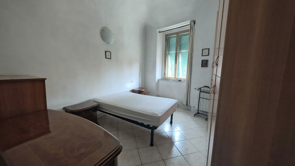 Ingrandisci la foto
