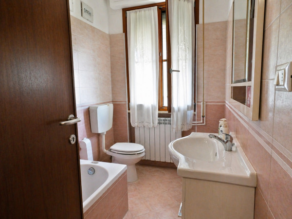 Ingrandisci la foto