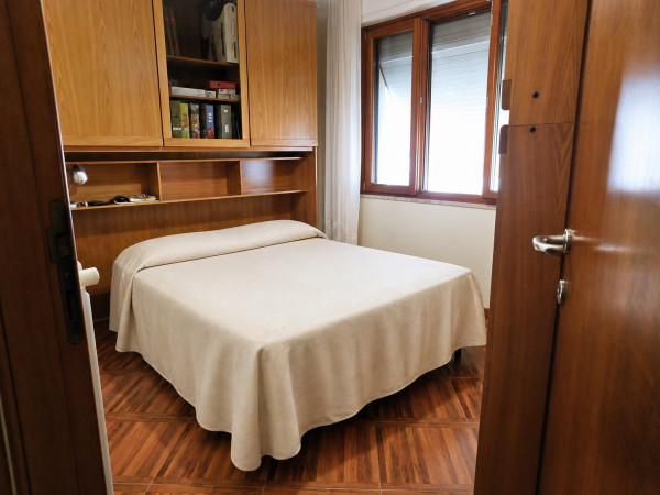 Ingrandisci la foto