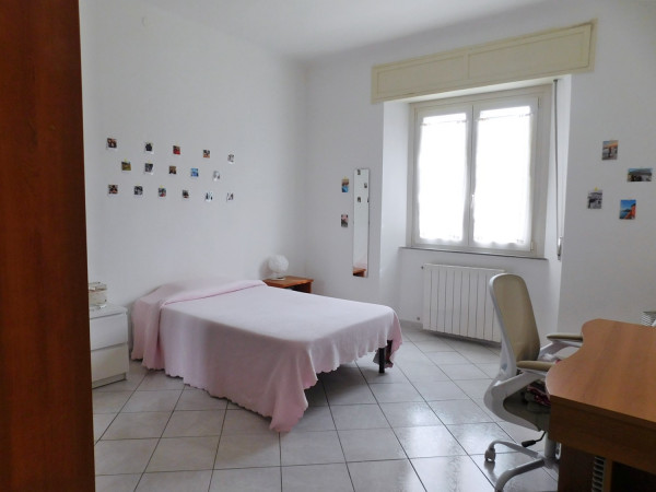 Ingrandisci la foto