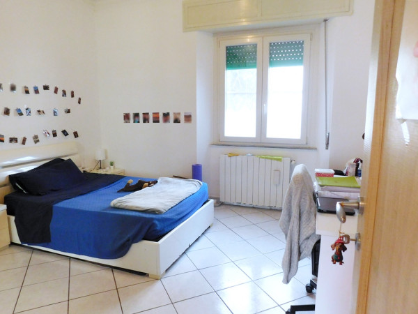 Ingrandisci la foto