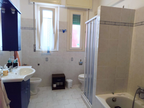 Ingrandisci la foto