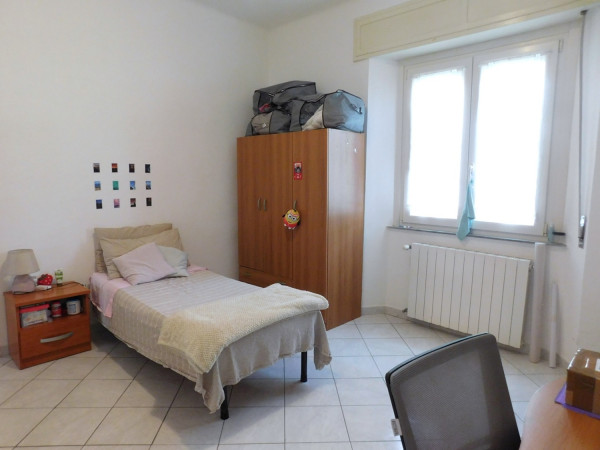 Ingrandisci la foto