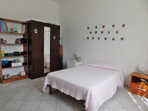 Ingrandisci la foto