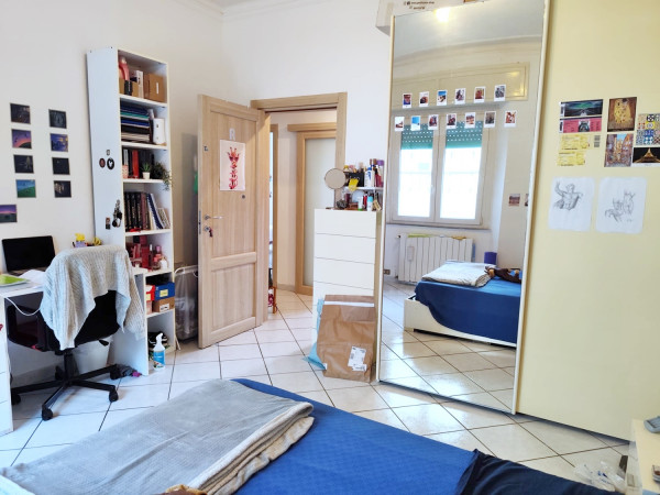 Ingrandisci la foto