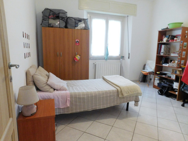 Ingrandisci la foto