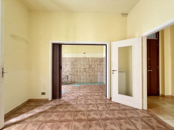 Ingrandisci la foto