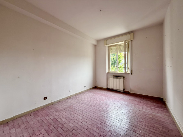 Ingrandisci la foto