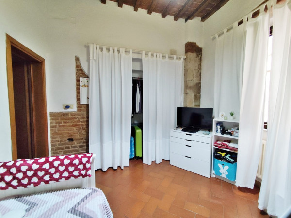 Ingrandisci la foto