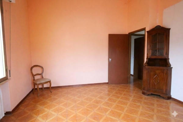 Ingrandisci la foto