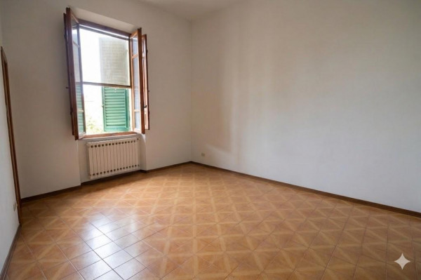 Ingrandisci la foto