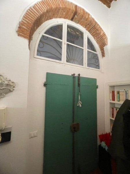 Ingrandisci la foto
