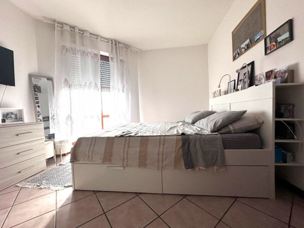 Ingrandisci la foto