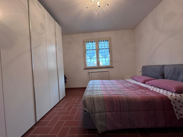 Ingrandisci la foto