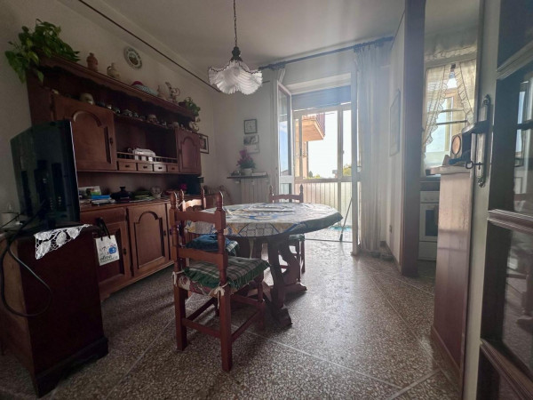 Ingrandisci la foto