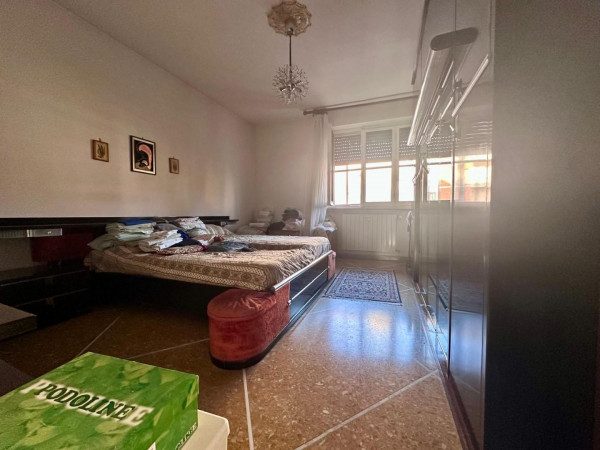 Ingrandisci la foto