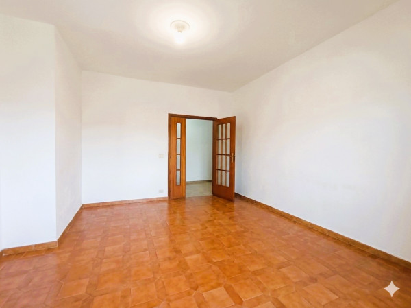 Ingrandisci la foto