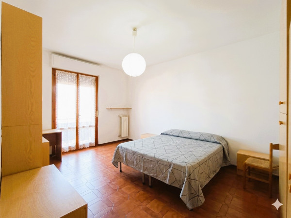 Ingrandisci la foto