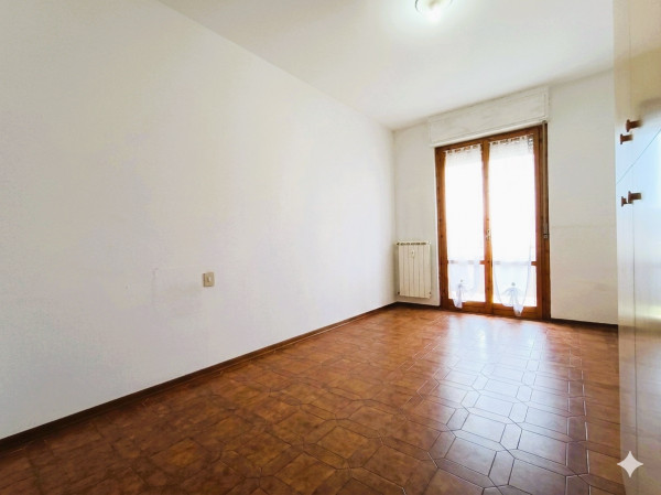 Ingrandisci la foto