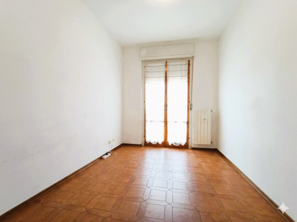 Ingrandisci la foto