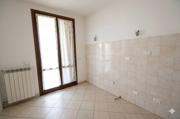 Ingrandisci la foto