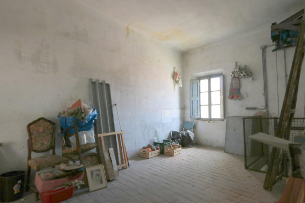 Ingrandisci la foto
