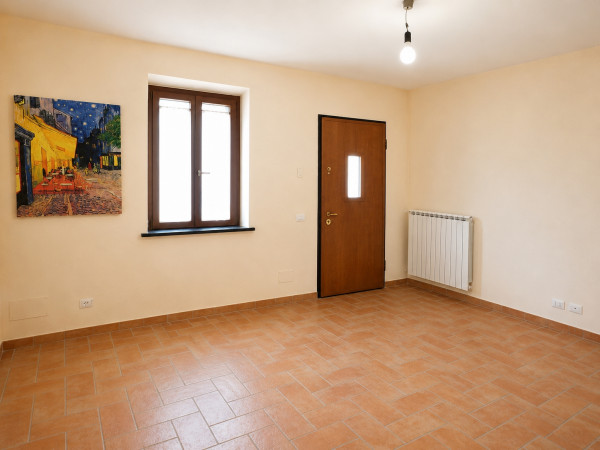 Ingrandisci la foto