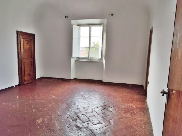 Ingrandisci la foto