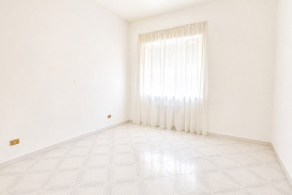 Ingrandisci la foto
