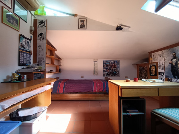 Ingrandisci la foto