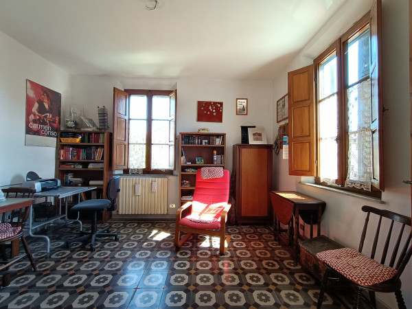 Ingrandisci la foto