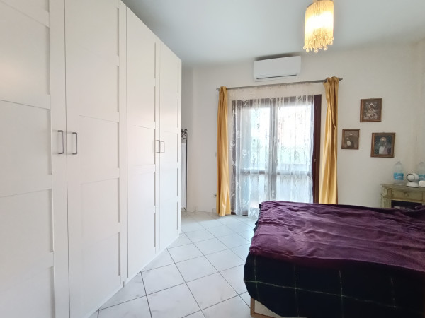 Ingrandisci la foto