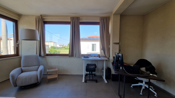 Ingrandisci la foto