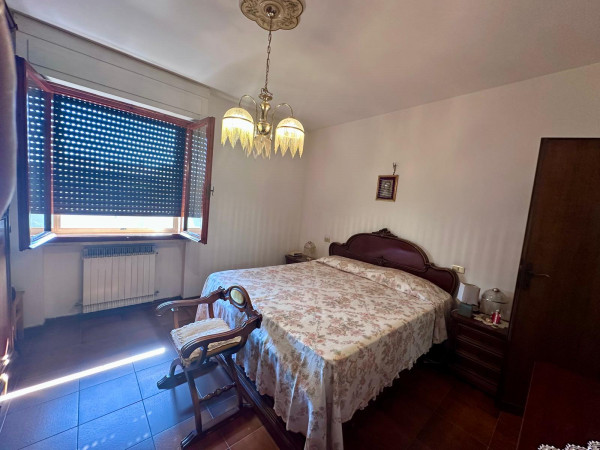 Ingrandisci la foto