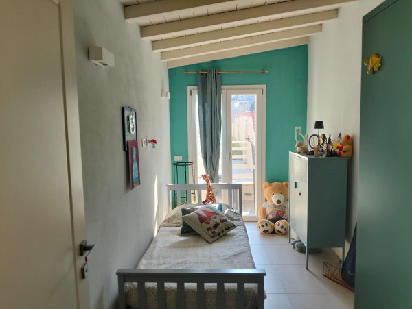 Ingrandisci la foto
