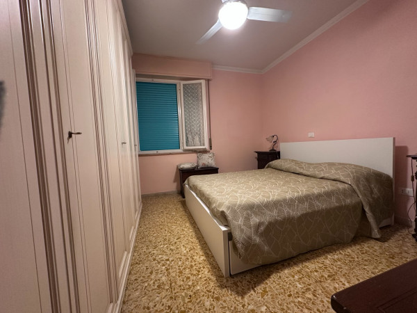 Ingrandisci la foto