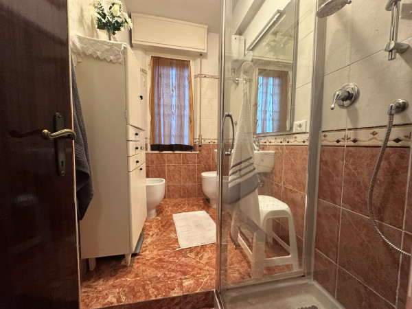 Ingrandisci la foto