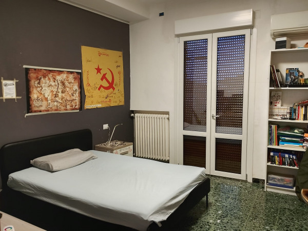 Ingrandisci la foto