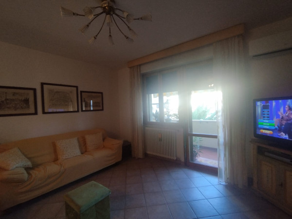 Ingrandisci la foto