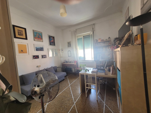 Ingrandisci la foto