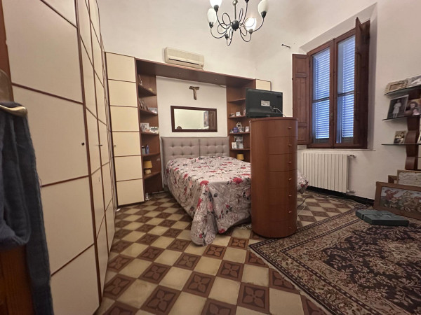 Ingrandisci la foto