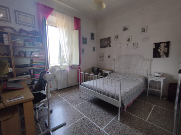 Ingrandisci la foto
