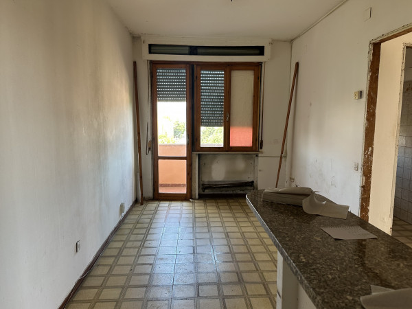 Ingrandisci la foto