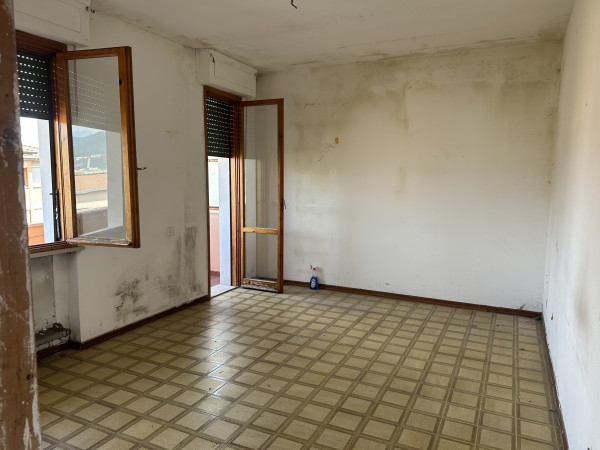 Ingrandisci la foto