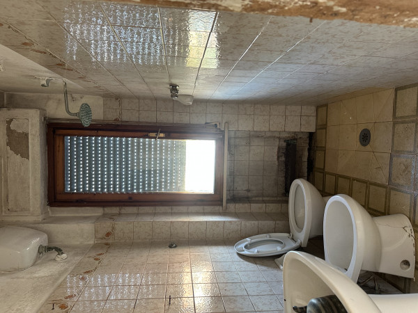 Ingrandisci la foto