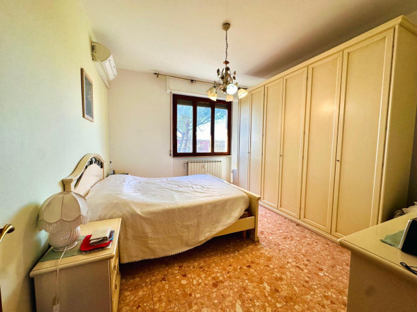 Ingrandisci la foto