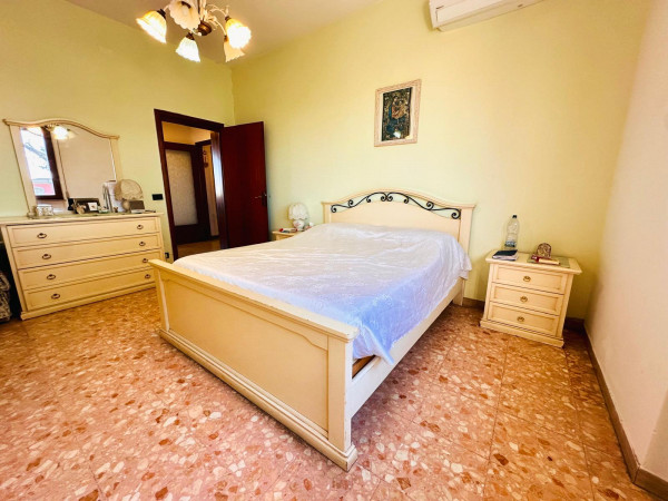 Ingrandisci la foto